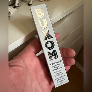 Buxom Plump Shot Lip Serum In GET
NAKED, Brand New Never Used.